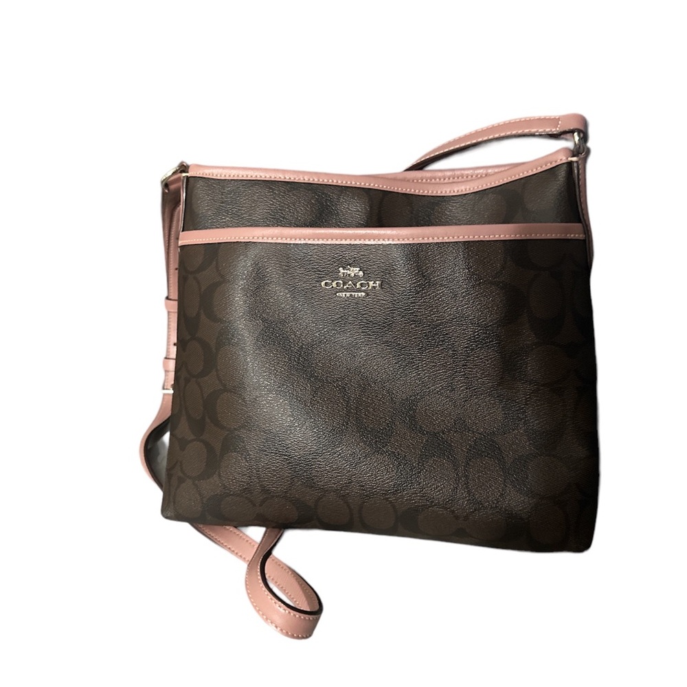 Coach like new brown signature with pink trim and strap and inside crossbody